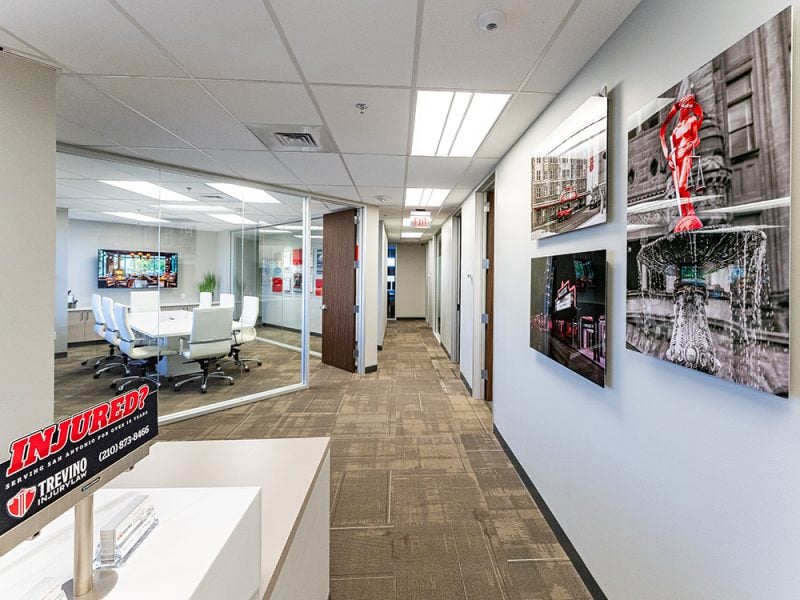 Trevino Injury Law office interior in San Antonio showing a modern conference room and hallway where personal injury attorneys consult with truck accident clients and personal injury victims.